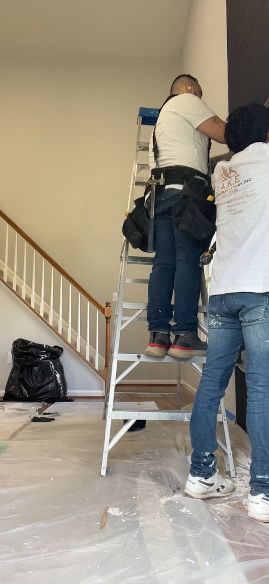 A set of stairs leading up to the second floor of a house