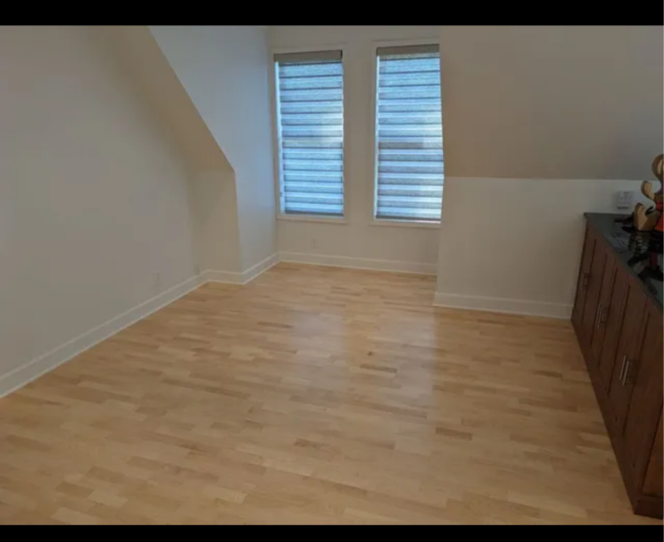 A set of stairs with a blue wall behind them