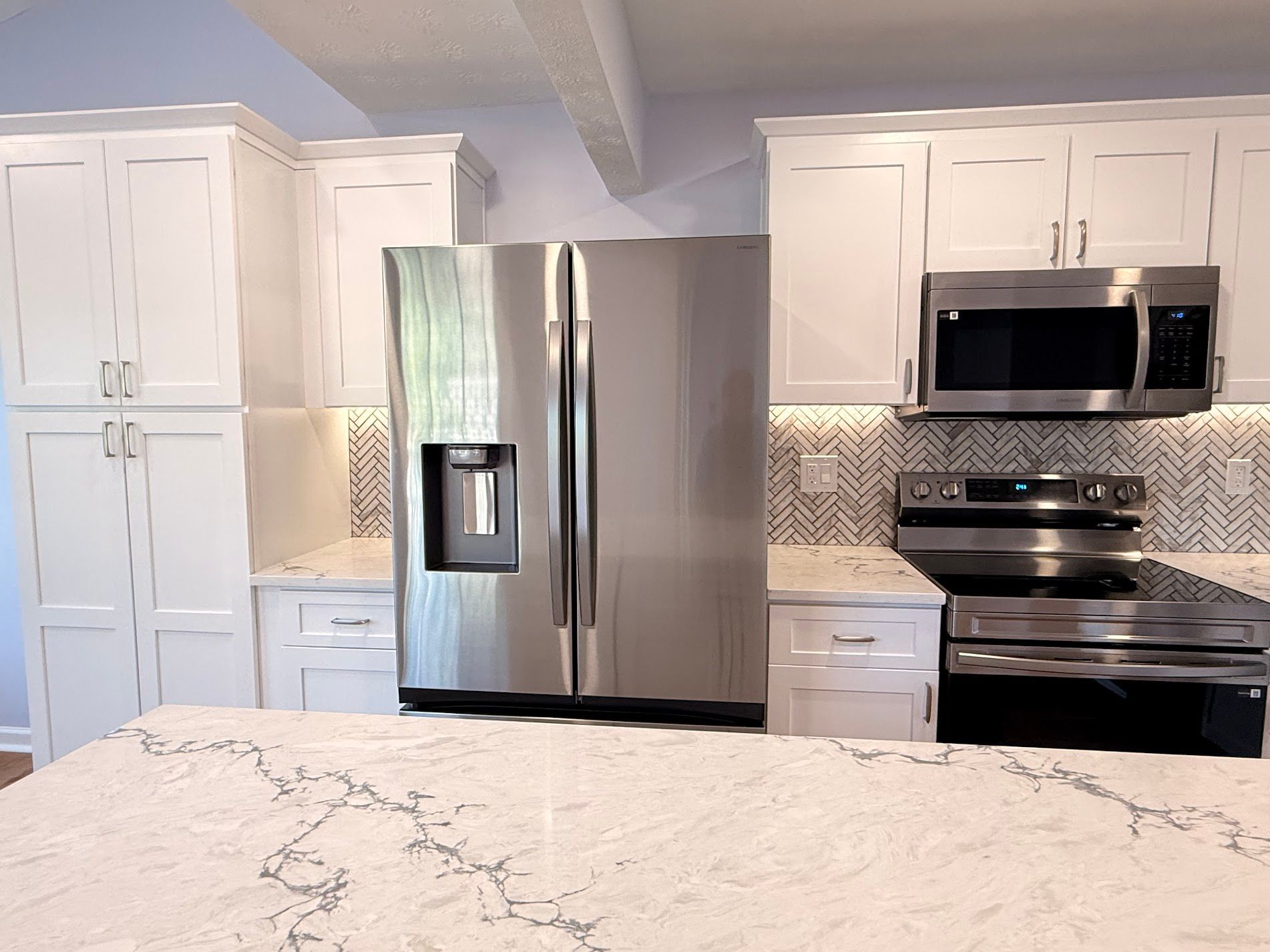 Modern kitchen white cabinetry renovation